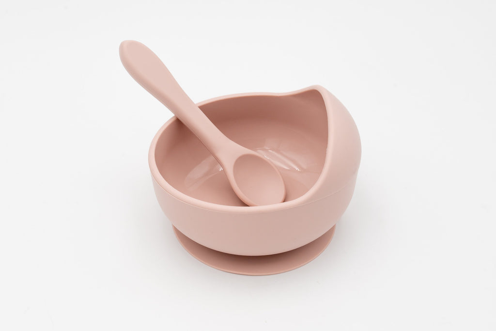 Bol rose clair avec ventouse et cuillère en silicone