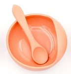 Vue du dessus du bol couleur argile avec cuillère en silicone