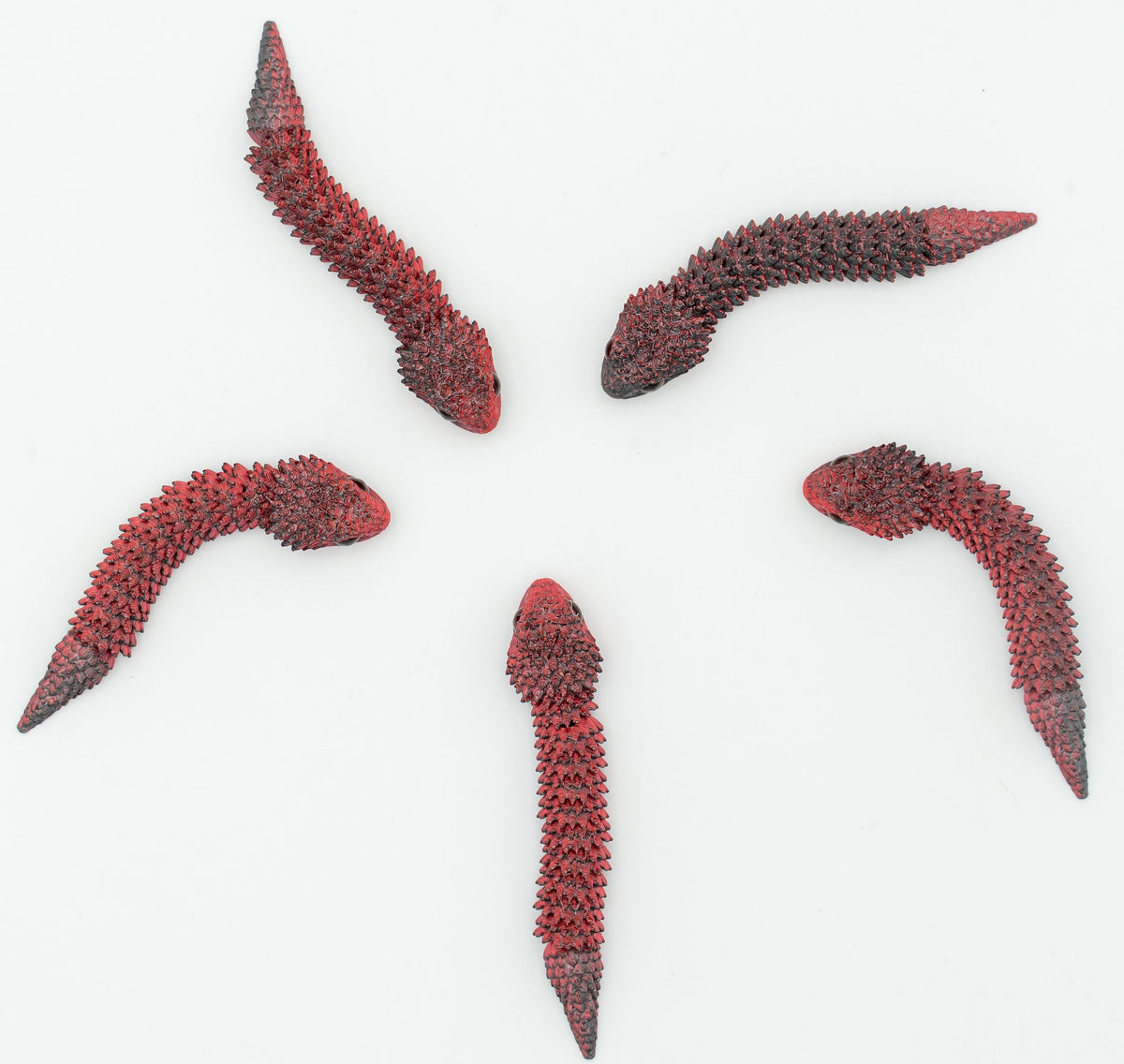 Serpents 3D articulés dans des tons rouge foncé