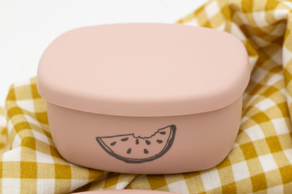 Boîte alimentaire rose en silicone avec un dessin de pastèque