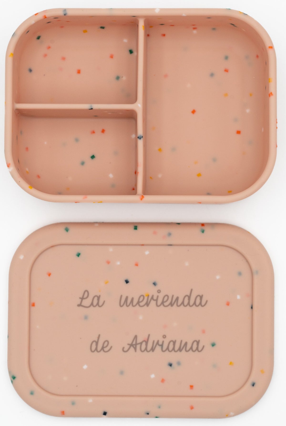 Boîte alimentaire XL en silicone ouverte à côté de son couvercle