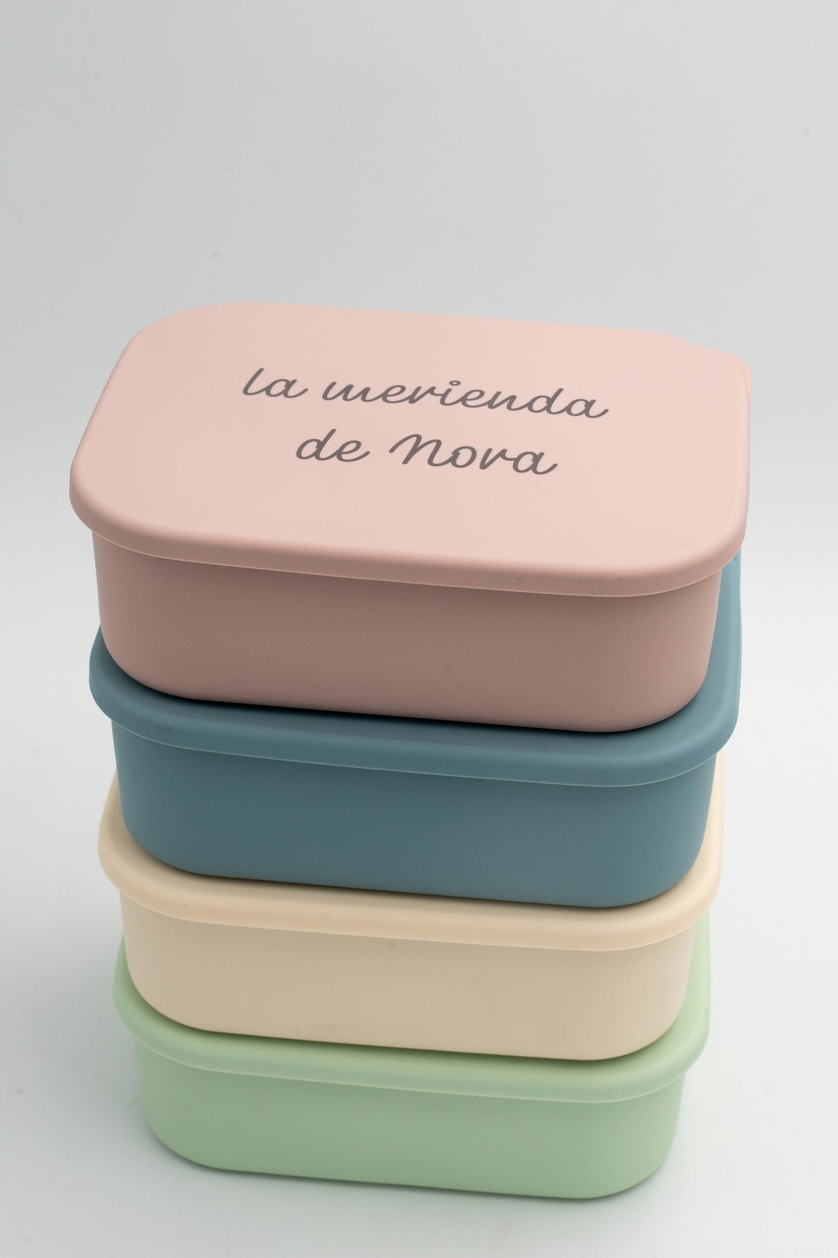 Boîtes repas XL en silicone et acier empilées en plusieurs couleurs