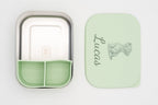 Tupper XL verde claro abierto con nombre y dibujo en la tapa